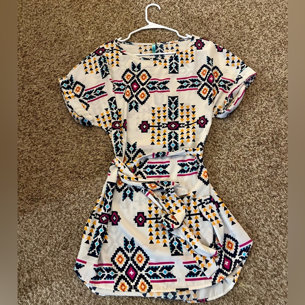 Geometric print dress- silk material has belt to tighten size medium